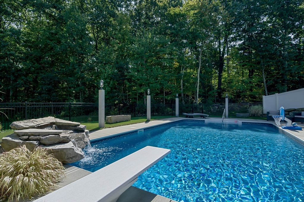 6 Carlson's Way Rutland, MA 01543 - Photo 28 of 34 a view of a backyard with sitting area
