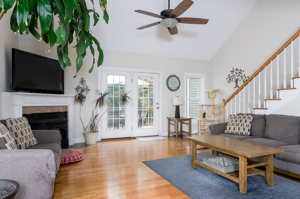 6 Carlson's Way Rutland, MA 01543 - Photo 8 of 34 a living room with furniture a fireplace and a flat screen tv