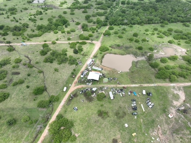 3507 Oil Field Road Bellville, TX 77418 - Photo 2 of 15 an aerial view of residential houses with outdoor space