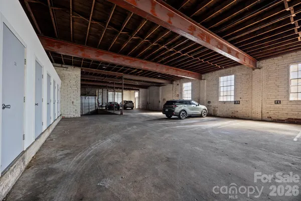 a big room with closet and a dishwasher