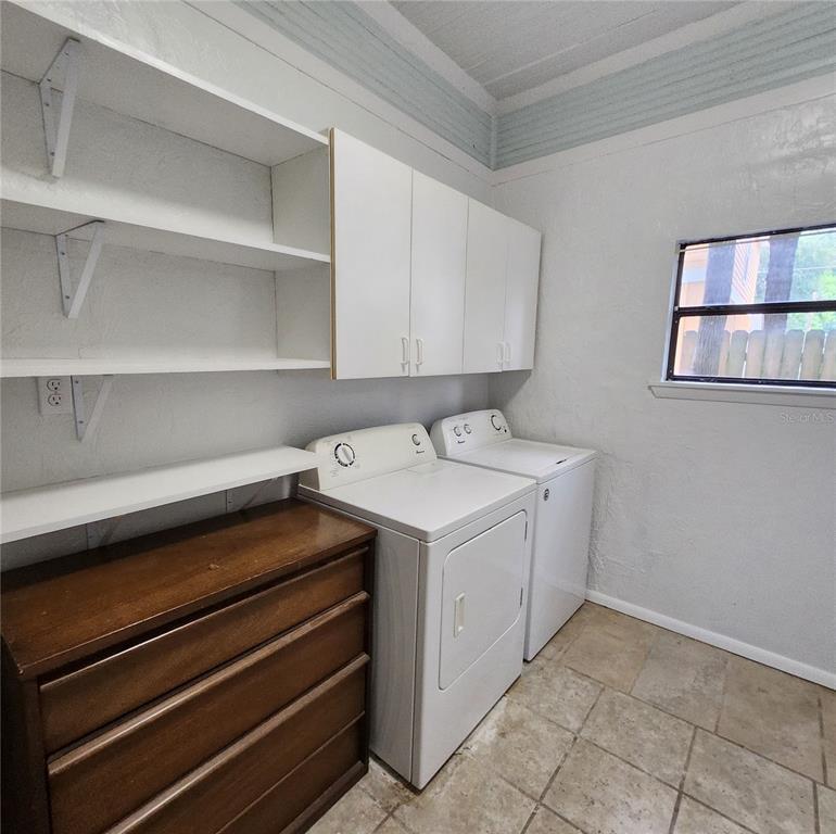 809 Northwest 4th Avenue Gainesville, FL 32601 - Photo 12 of 15 a utility room with dryer and washer