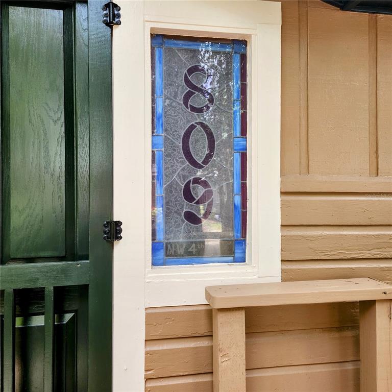 809 Northwest 4th Avenue Gainesville, FL 32601 - Photo 2 of 15 a bathroom with a sink and a mirror