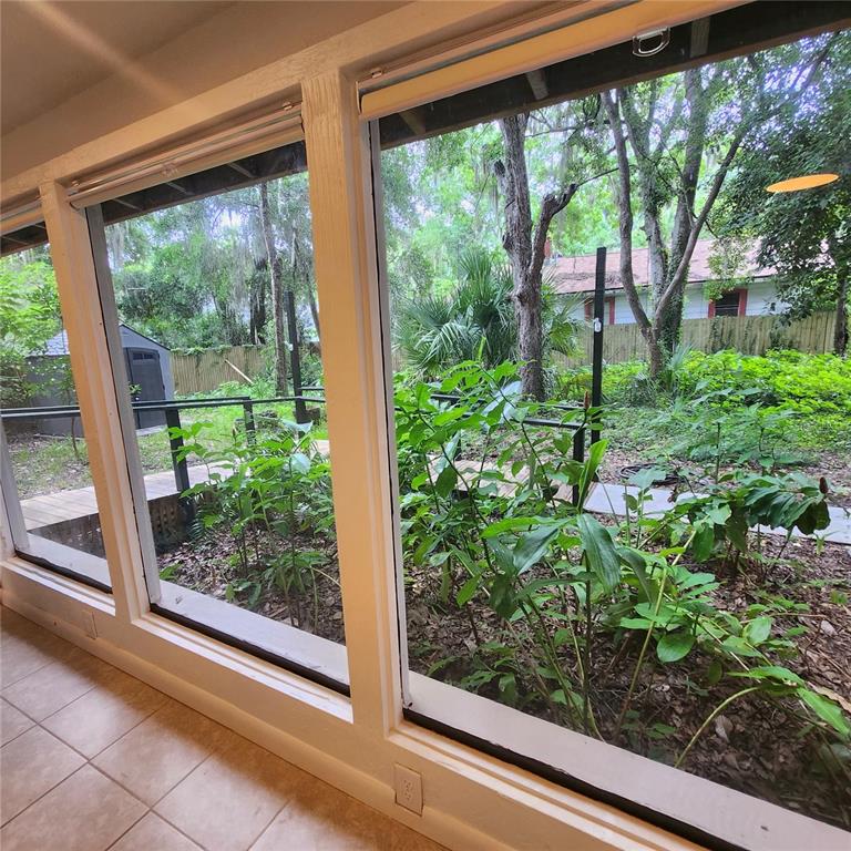 809 Northwest 4th Avenue Gainesville, FL 32601 - Photo 6 of 15 a view of a garden from a window