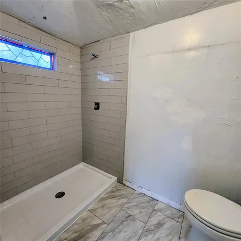 a bathroom with a sink and a toilet