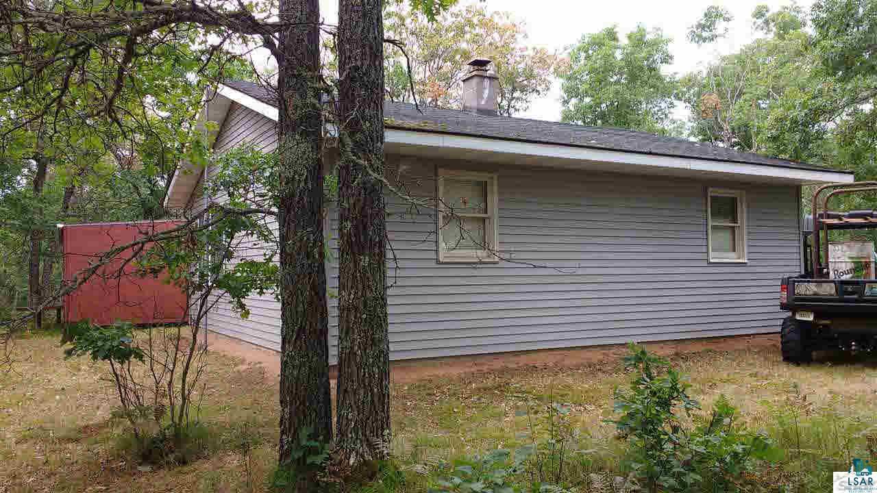 12915 South Flamang Road Gordon, WI 54838 - Photo 1 of 15 Side view of Cabin