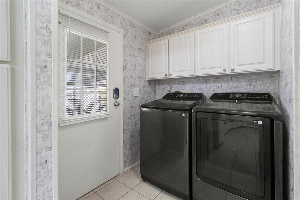 8307 Nancy Lane Ellenton, FL 34222 - Photo 15 of 57 a utility room with cabinets
