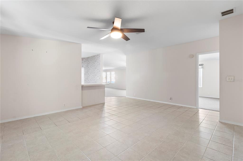 8307 Nancy Lane Ellenton, FL 34222 - Photo 19 of 57 wooden floor in an empty room with a window