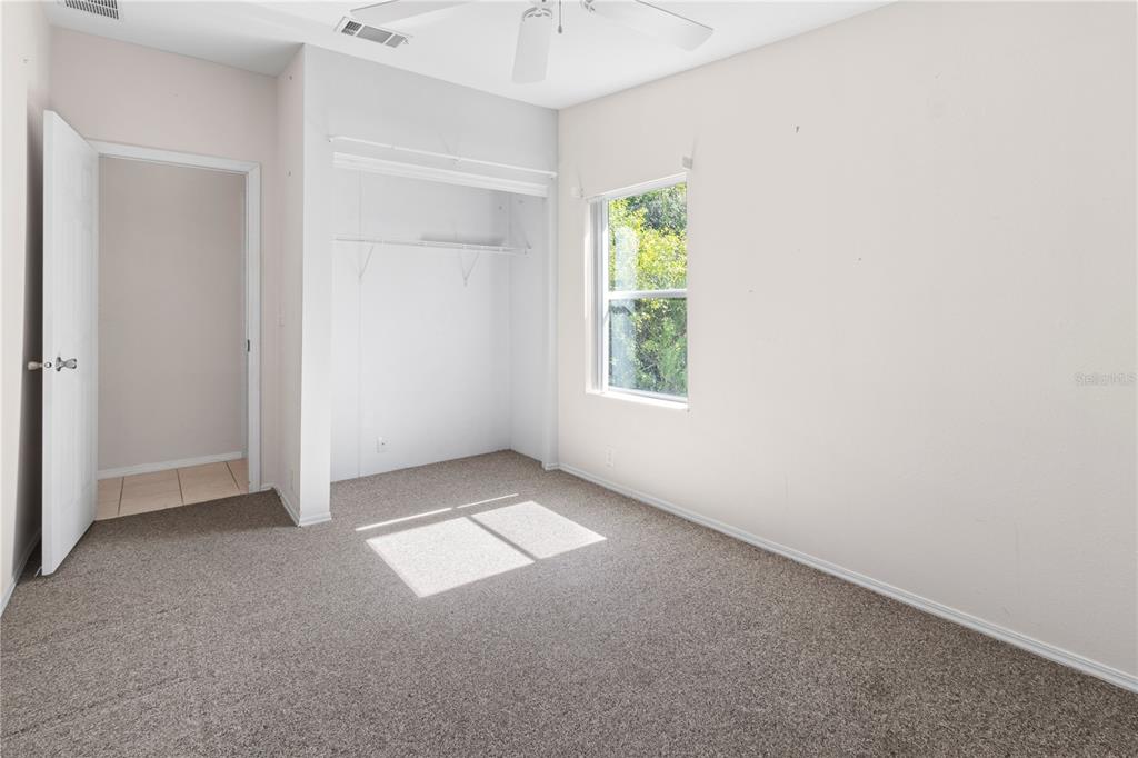 8307 Nancy Lane Ellenton, FL 34222 - Photo 38 of 57 an empty room with windows