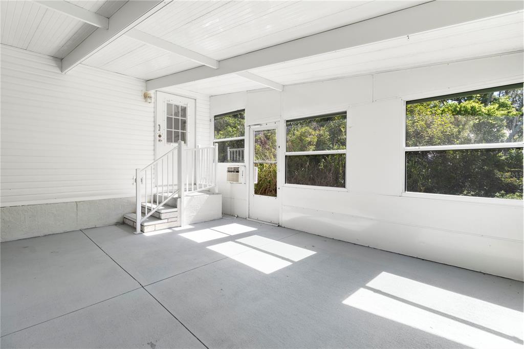 8307 Nancy Lane Ellenton, FL 34222 - Photo 41 of 57 a living room with furniture and large windows