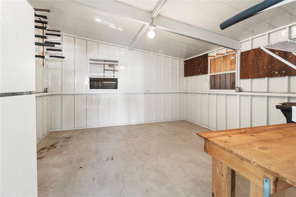 8307 Nancy Lane Ellenton, FL 34222 - Photo 45 of 57 a view of a refrigerator in kitchen and white cabinets