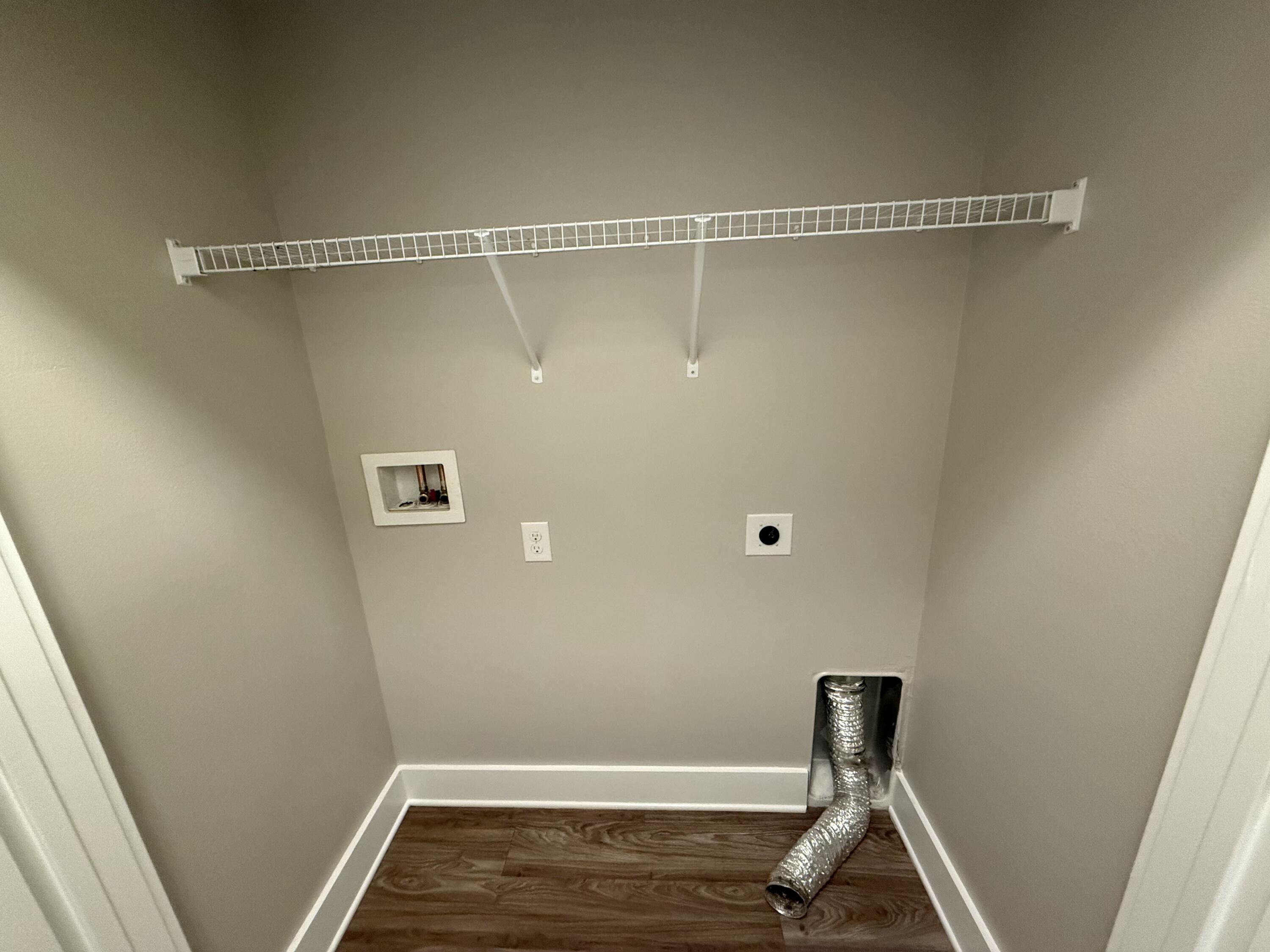 142 North Sand Palm Road Freeport, FL 32439 - Photo 22 of 26 a view of a room with wooden floor