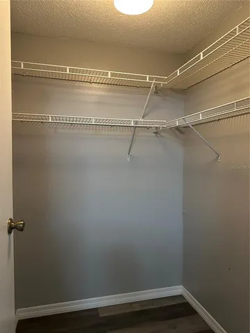 a view of a room with racks on the wall