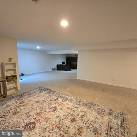 a view of a livingroom with wooden floor