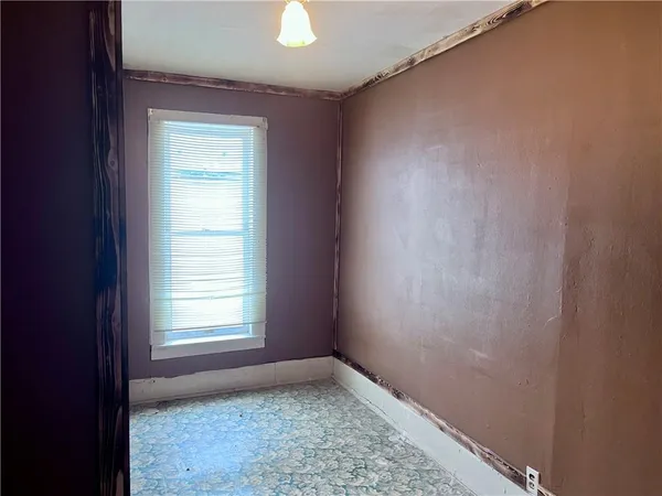 an empty room with a window