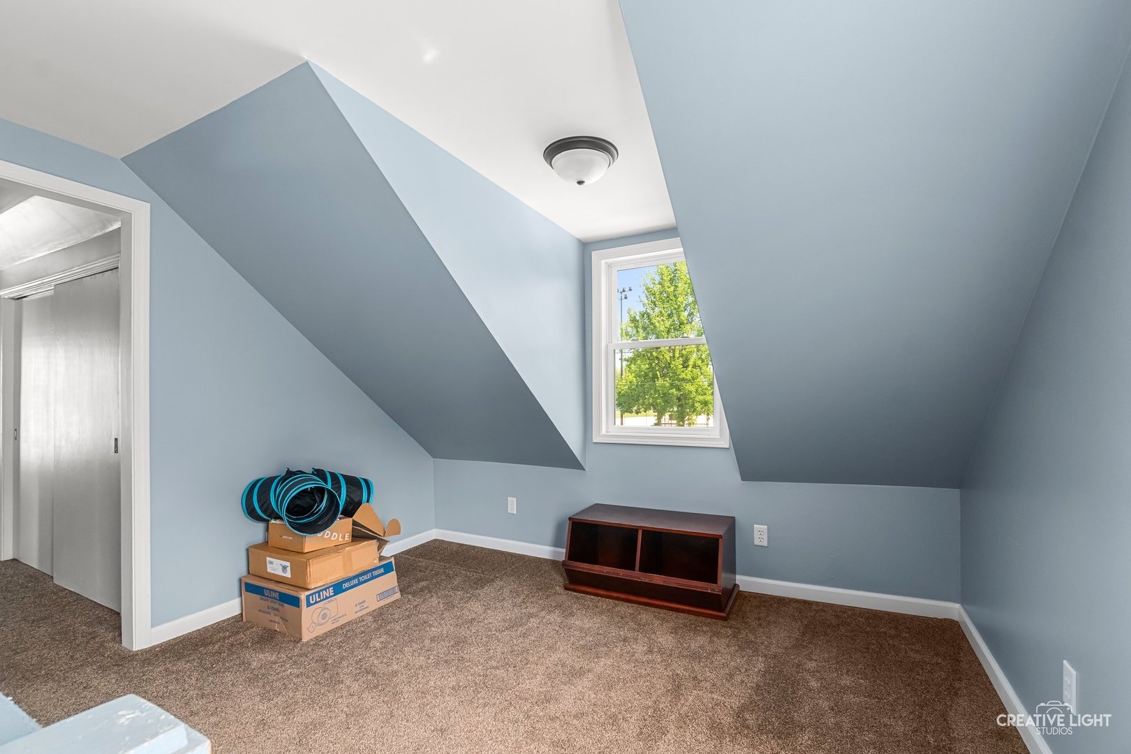 1606 Clark Street DeKalb, IL 60115 - Photo 11 of 20 an empty room with windows