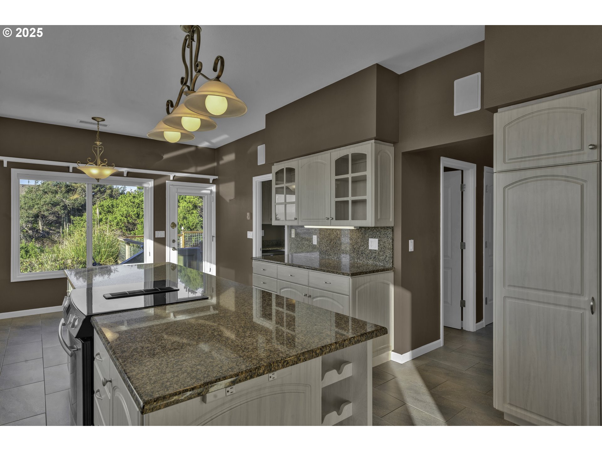 88765 Shoreline Loop Florence, OR 97439 - Photo 15 of 48 a view of a dining room with furniture window and outside view