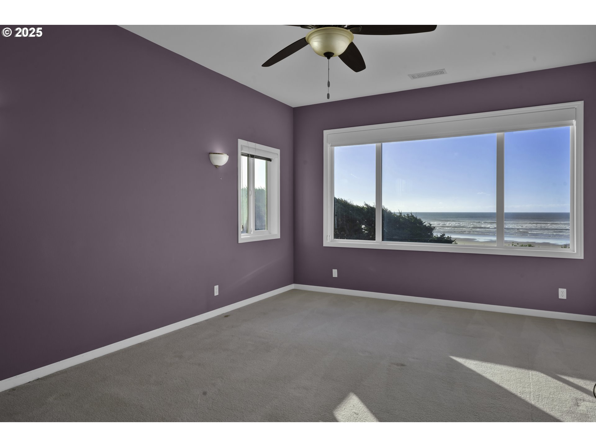 88765 Shoreline Loop Florence, OR 97439 - Photo 20 of 48 a view of an empty room with a window