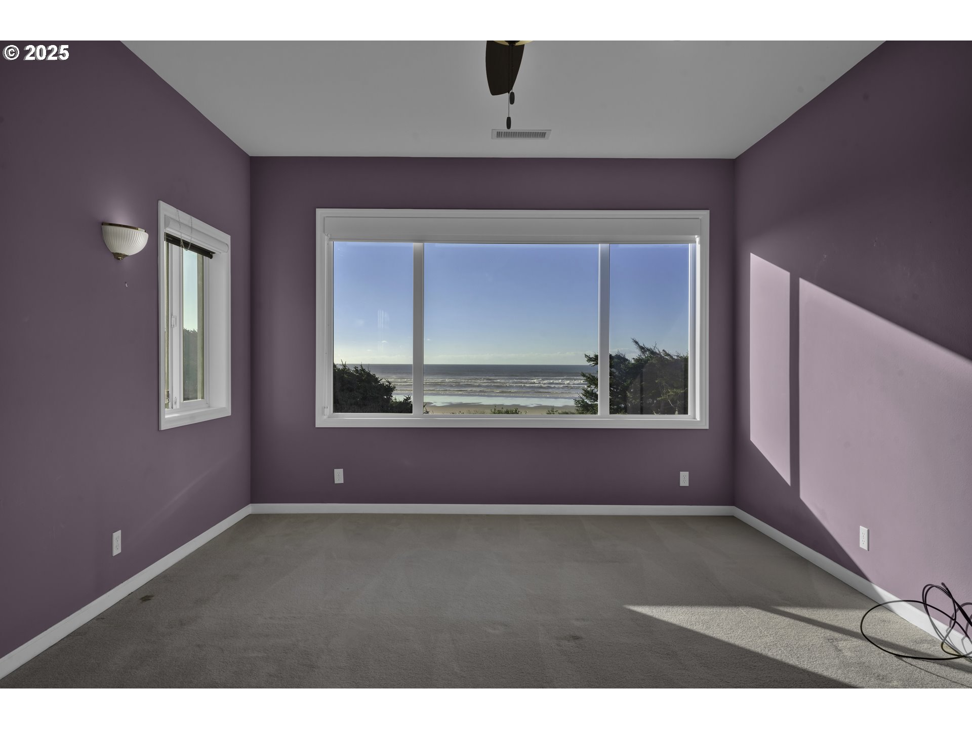 88765 Shoreline Loop Florence, OR 97439 - Photo 21 of 48 a view of an empty room with a window