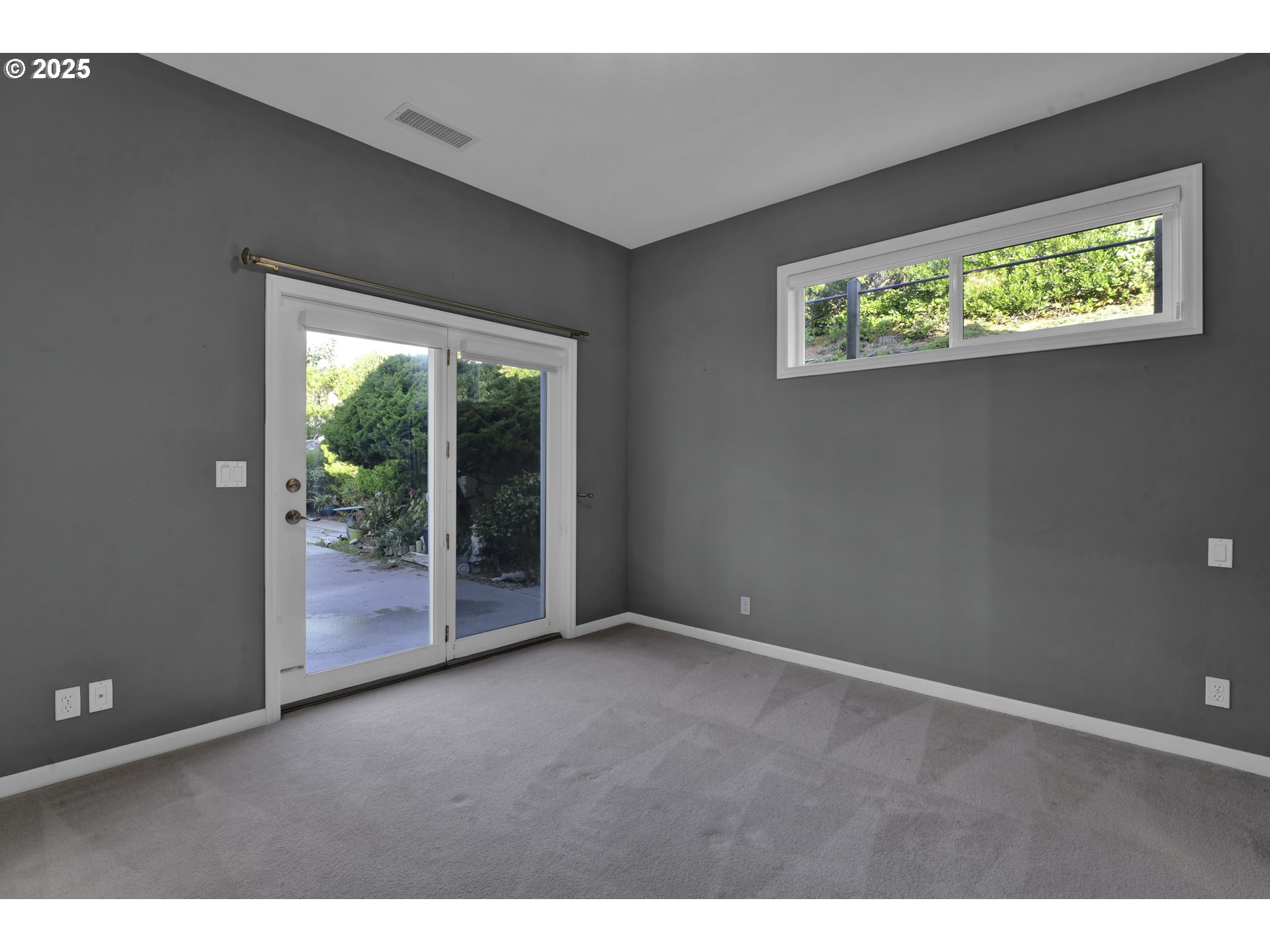 88765 Shoreline Loop Florence, OR 97439 - Photo 28 of 48 a view of an empty room with a window
