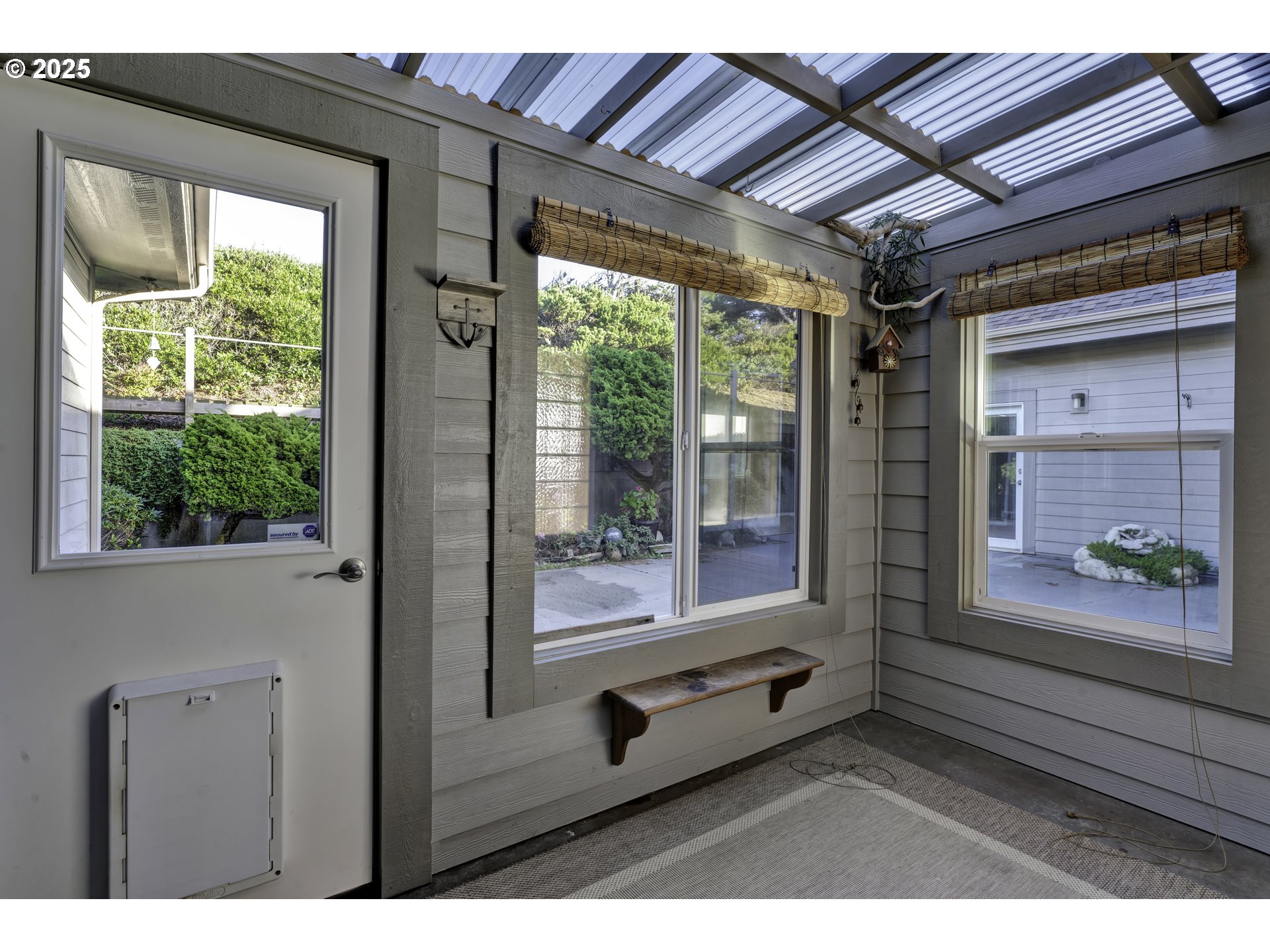 88765 Shoreline Loop Florence, OR 97439 - Photo 38 of 48 a room with furniture and large windows