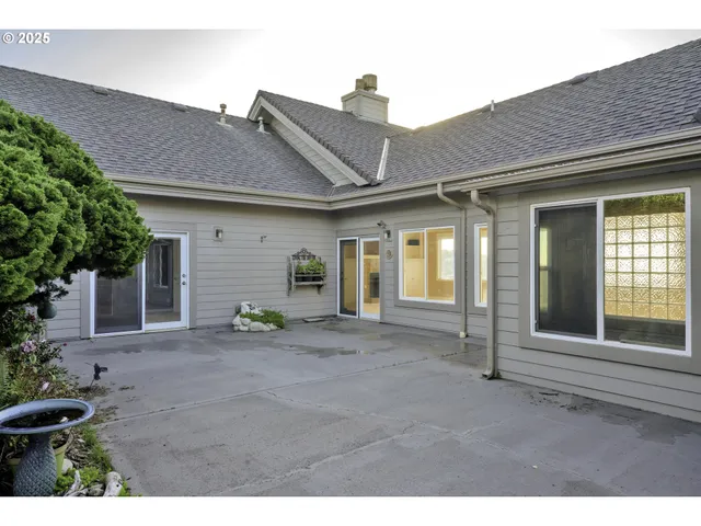 a view of a yard with an outdoor space