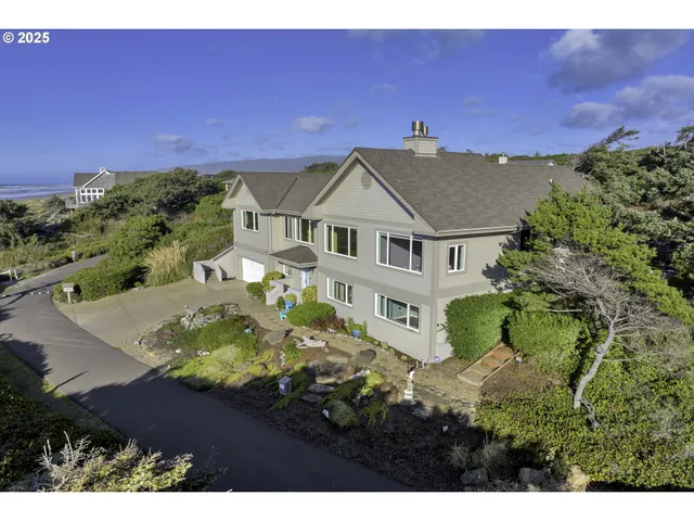 a view of a town with mountains in the background