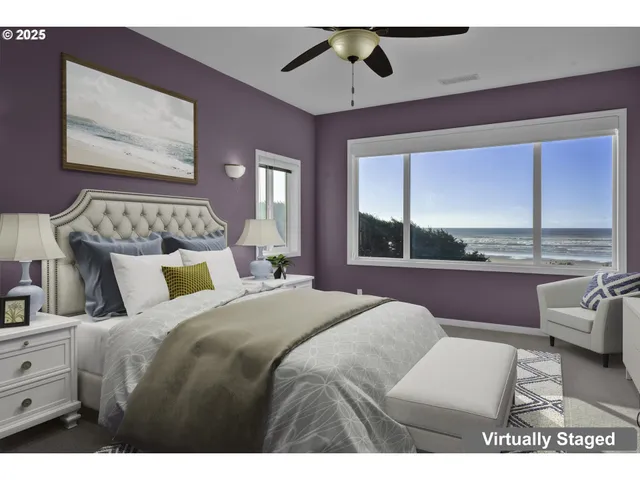 a bedroom with a large bed and a large window