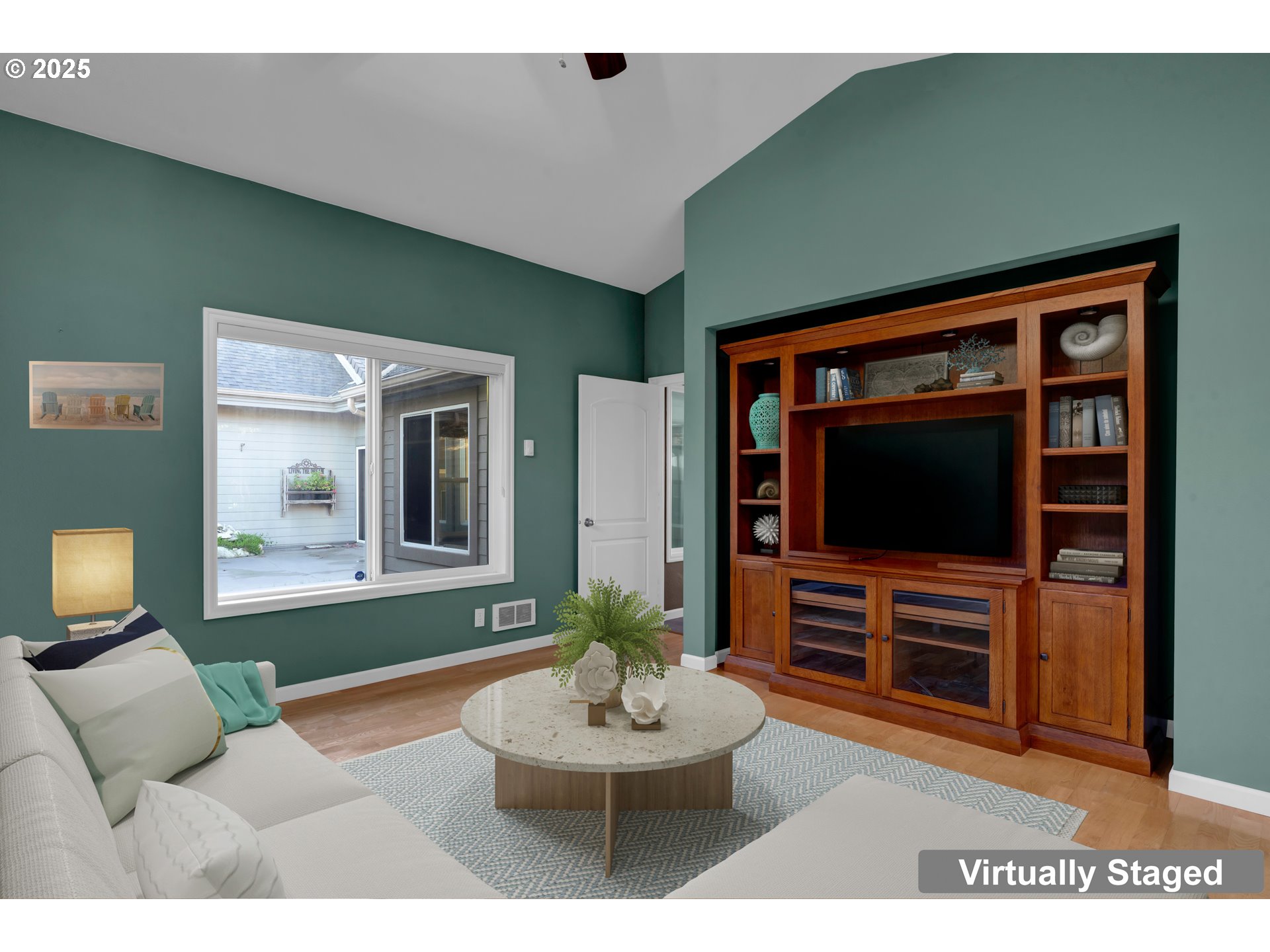 88765 Shoreline Loop Florence, OR 97439 - Photo 6 of 48 a living room with furniture and a flat screen tv