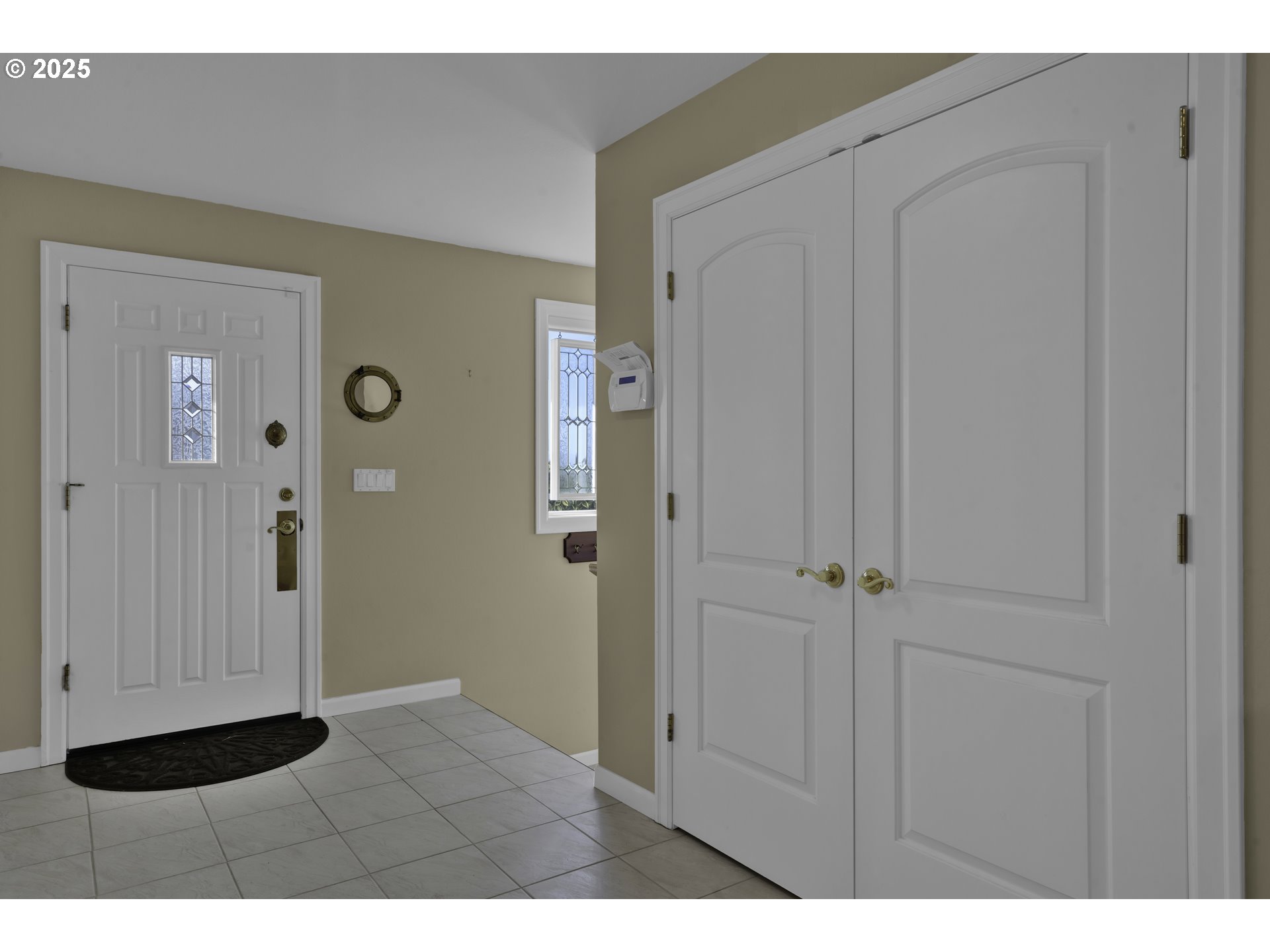 88765 Shoreline Loop Florence, OR 97439 - Photo 7 of 48 a view of an entryway with wooden floor