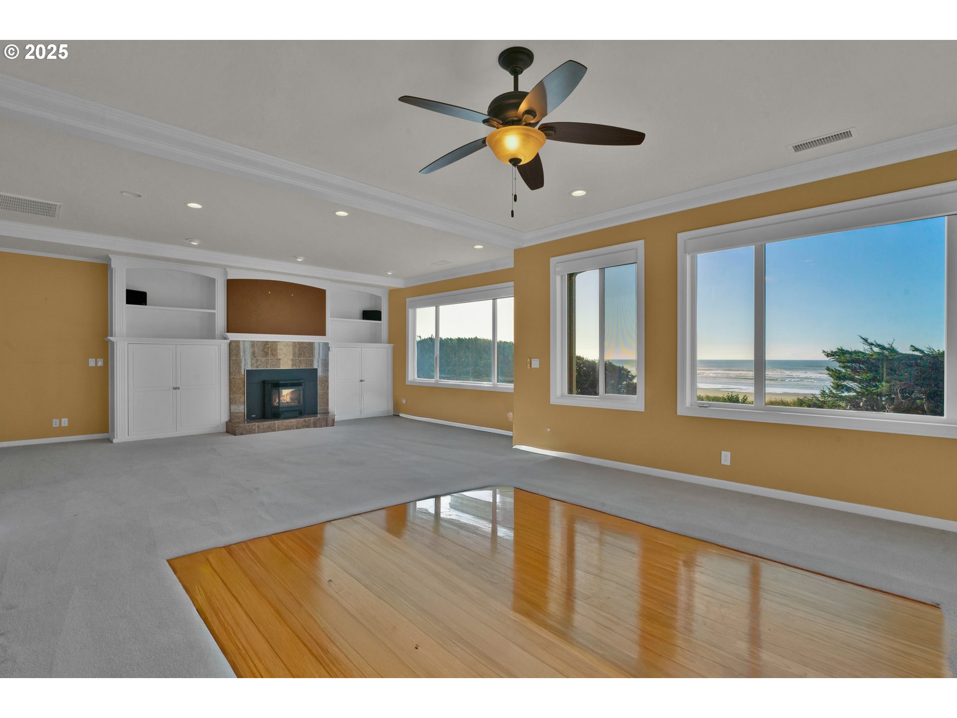 88765 Shoreline Loop Florence, OR 97439 - Photo 8 of 48 a living room with furniture and a fireplace