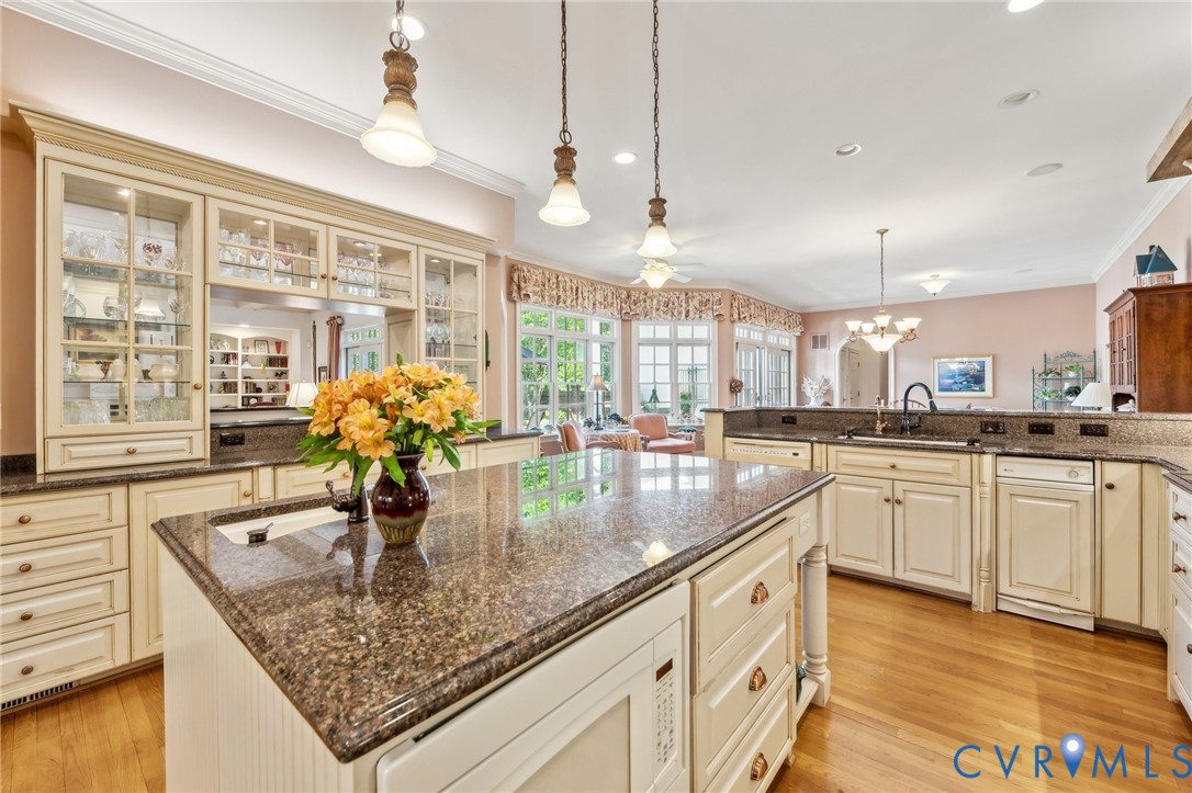 13901 Dunkeld Terrace Midlothian, VA 23113 - Photo 13 of 44 a kitchen with stainless steel appliances granite countertop a sink a oven and a counter space