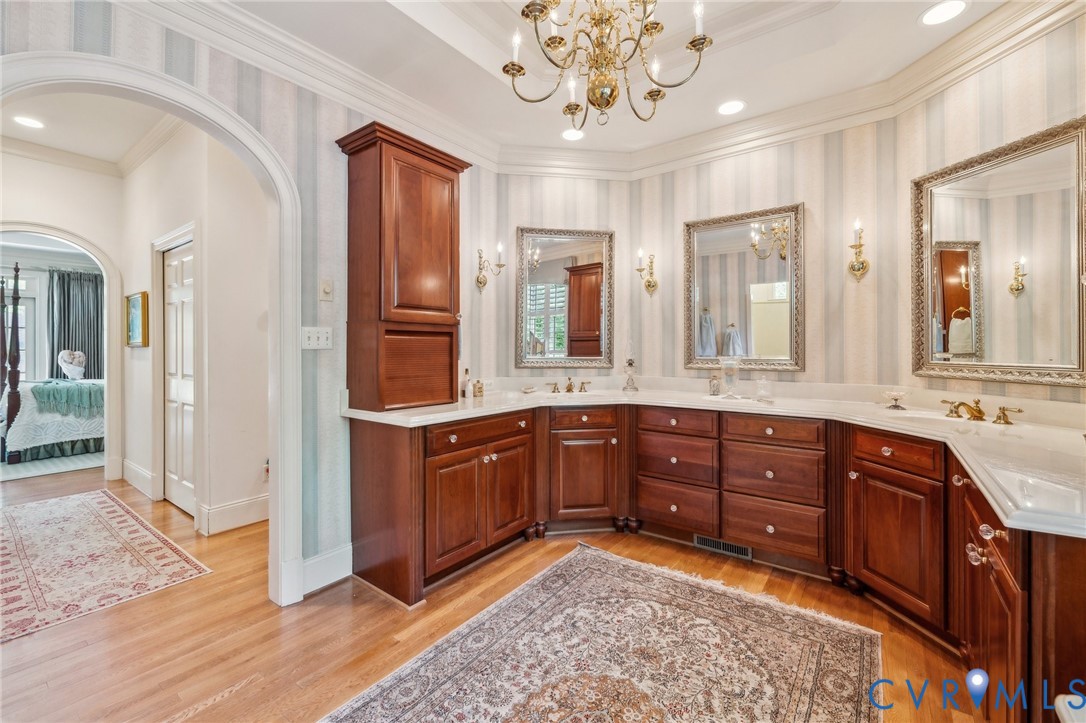 13901 Dunkeld Terrace Midlothian, VA 23113 - Photo 22 of 44 a spacious bathroom with a granite countertop double vanity sink mirror and bathtub