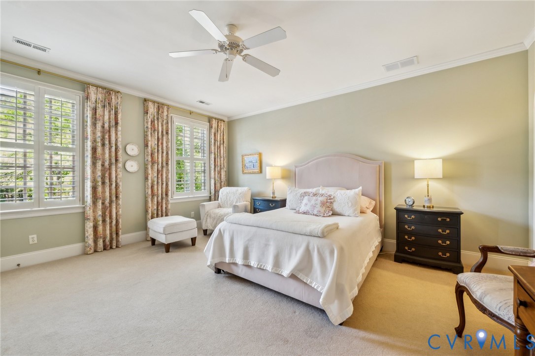 13901 Dunkeld Terrace Midlothian, VA 23113 - Photo 28 of 44 a spacious bedroom with a bed and a large window