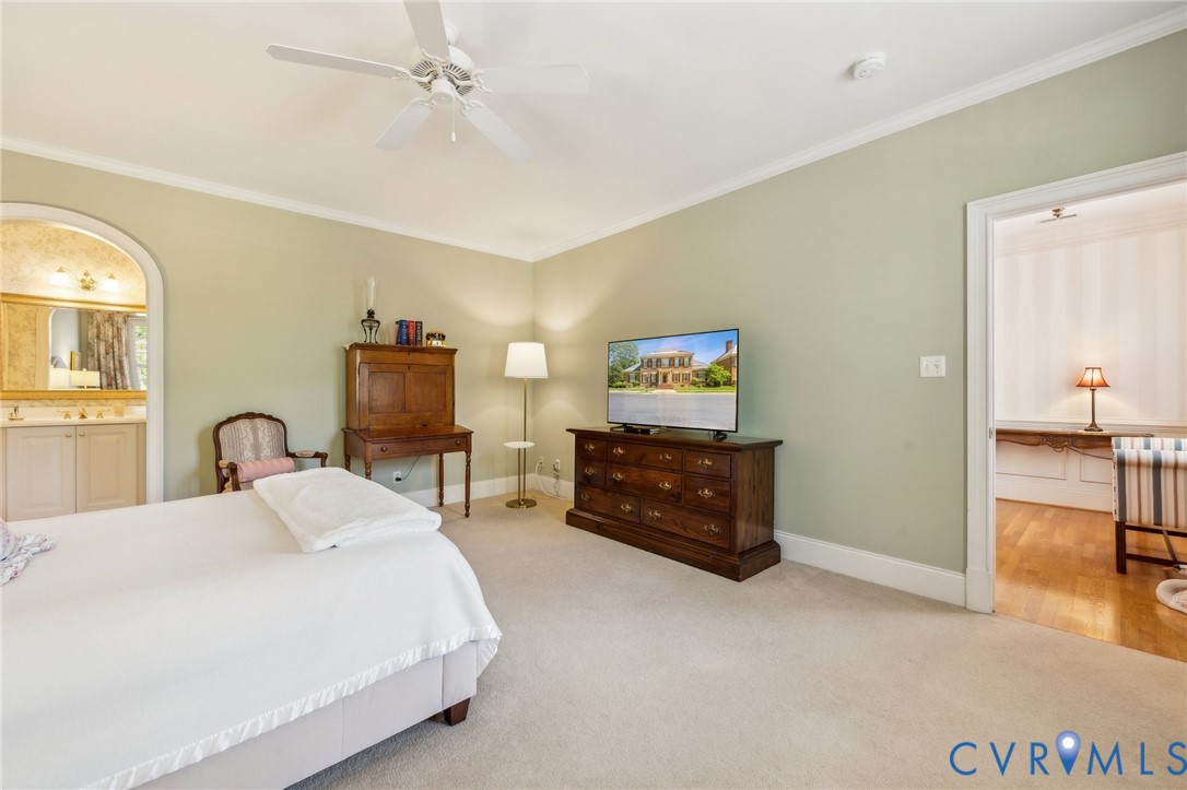 13901 Dunkeld Terrace Midlothian, VA 23113 - Photo 30 of 44 a bedroom with a bed and a flat screen tv