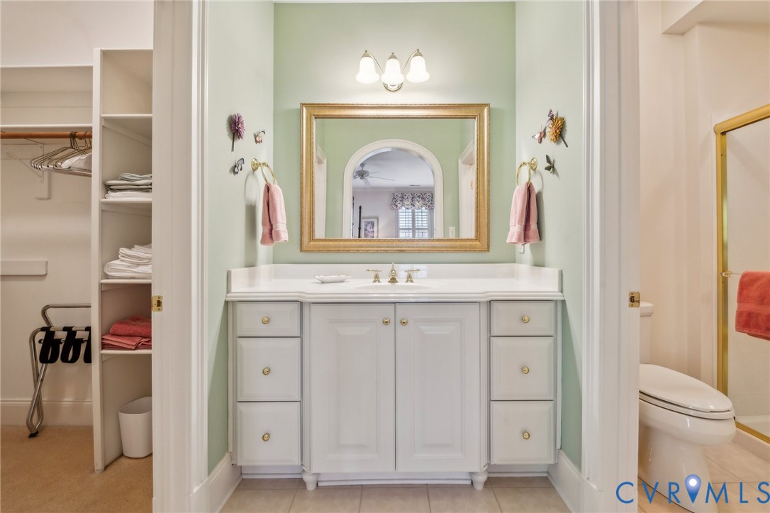 13901 Dunkeld Terrace Midlothian, VA 23113 - Photo 34 of 44 a view of a bathroom with a sink and a mirror