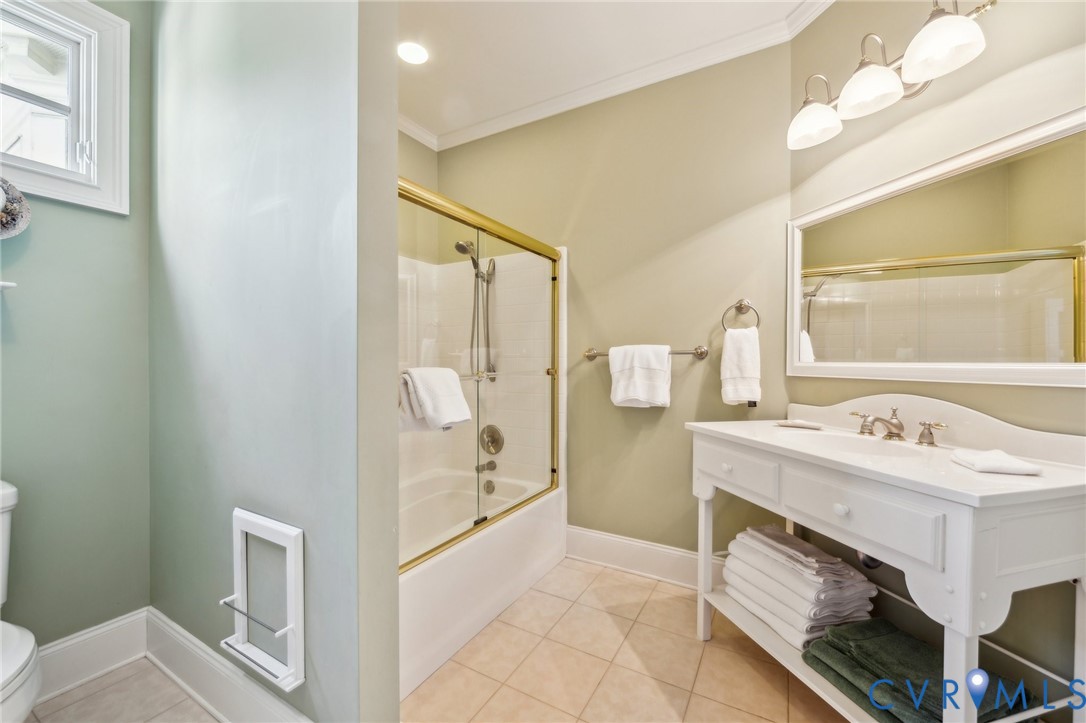 13901 Dunkeld Terrace Midlothian, VA 23113 - Photo 37 of 44 a bathroom with a sink a mirror and a shower