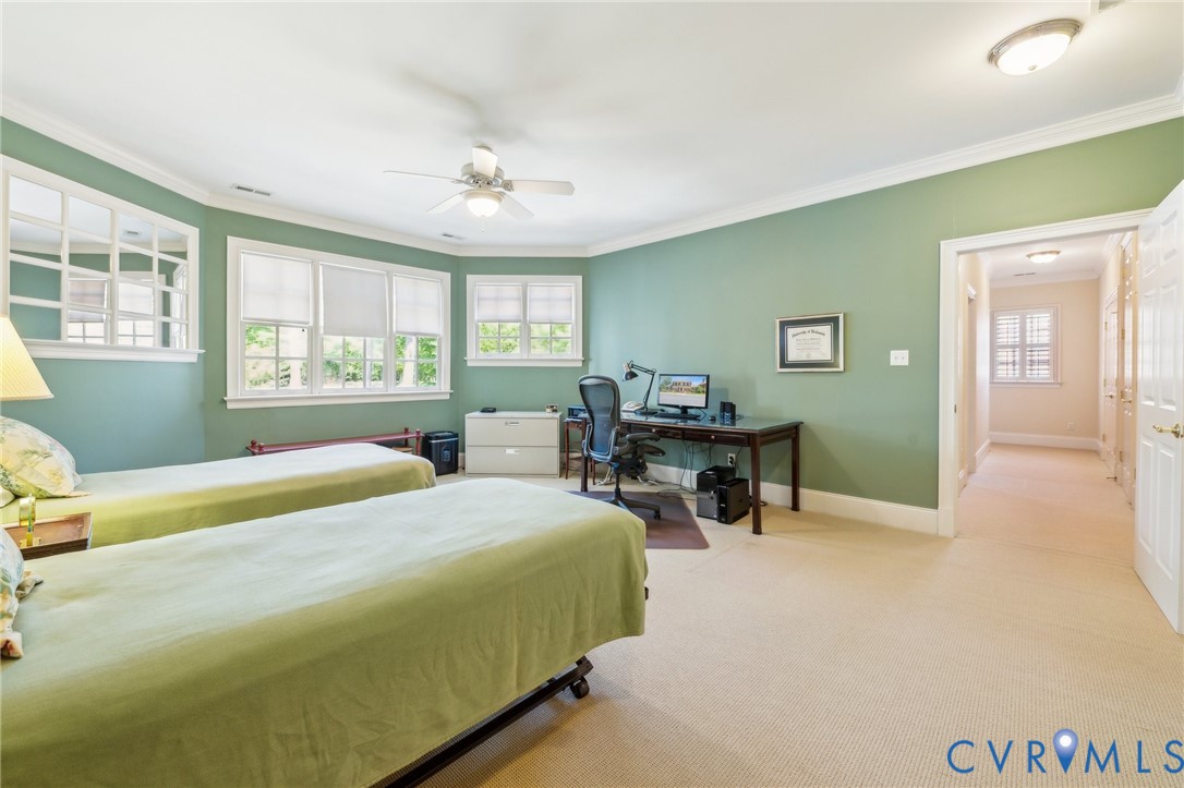 13901 Dunkeld Terrace Midlothian, VA 23113 - Photo 39 of 44 a bedroom with a bed and a table in it