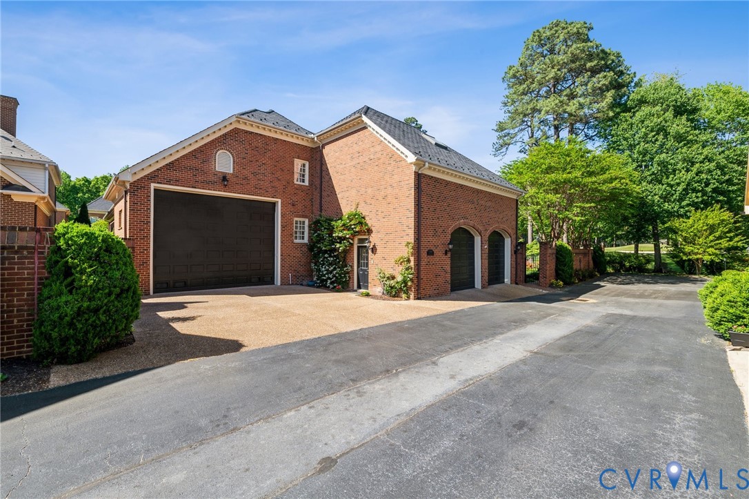 13901 Dunkeld Terrace Midlothian, VA 23113 - Photo 4 of 44 a front view of a house with yard and garage