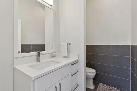 a bedroom with a bed and a view of bathroom