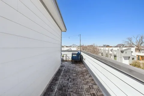 a backyard of a house with outdoor seating