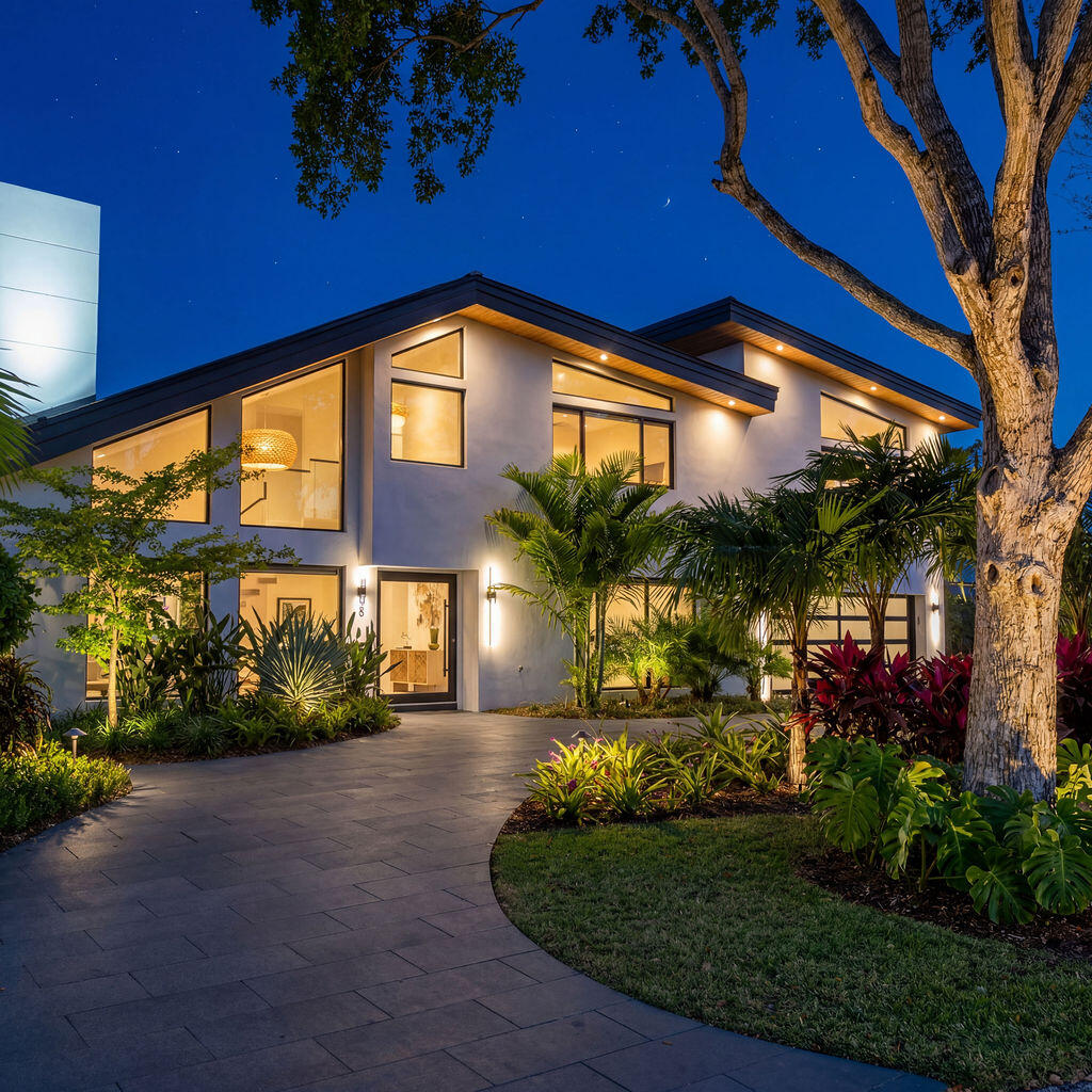 3001 Northeast 52nd Street Lighthouse Point, FL 33064 - Photo 2 of 61 a front view of house with yard