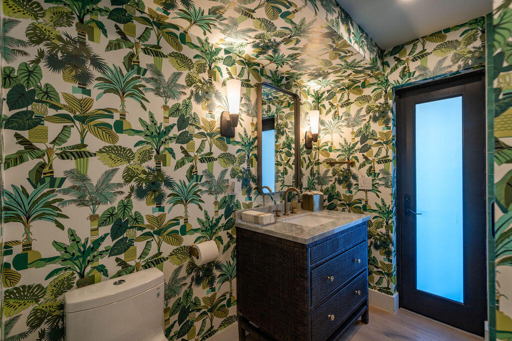 3001 Northeast 52nd Street Lighthouse Point, FL 33064 - Photo 22 of 61 a bathroom with a sink and a mirror
