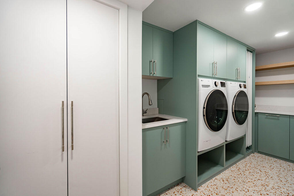 3001 Northeast 52nd Street Lighthouse Point, FL 33064 - Photo 25 of 61 a utility room with dryer and washer