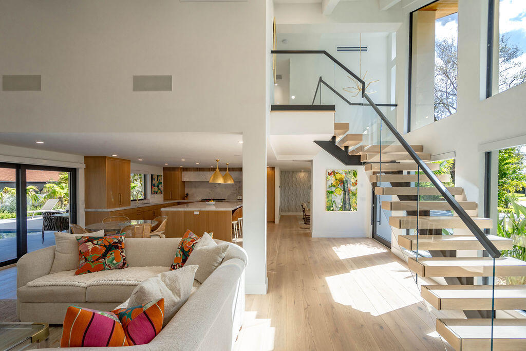 3001 Northeast 52nd Street Lighthouse Point, FL 33064 - Photo 26 of 61 a living room with furniture and stairs