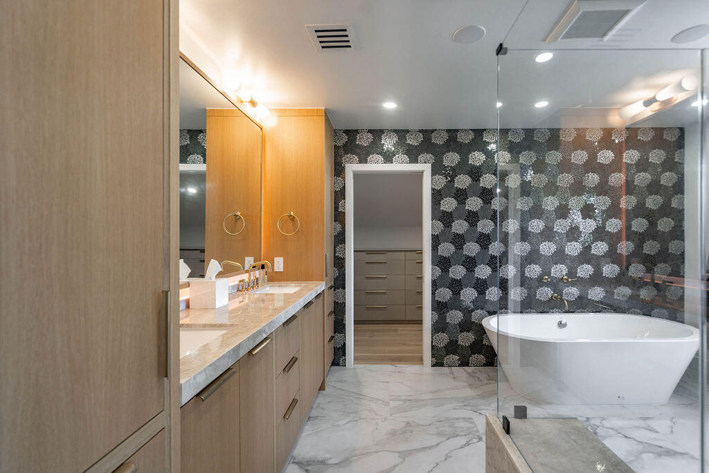 3001 Northeast 52nd Street Lighthouse Point, FL 33064 - Photo 33 of 61 a bathroom with a bathtub and shower