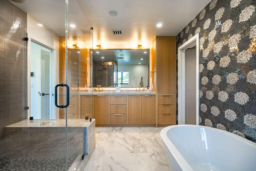 3001 Northeast 52nd Street Lighthouse Point, FL 33064 - Photo 35 of 61 a bathroom with a bathtub and a shower