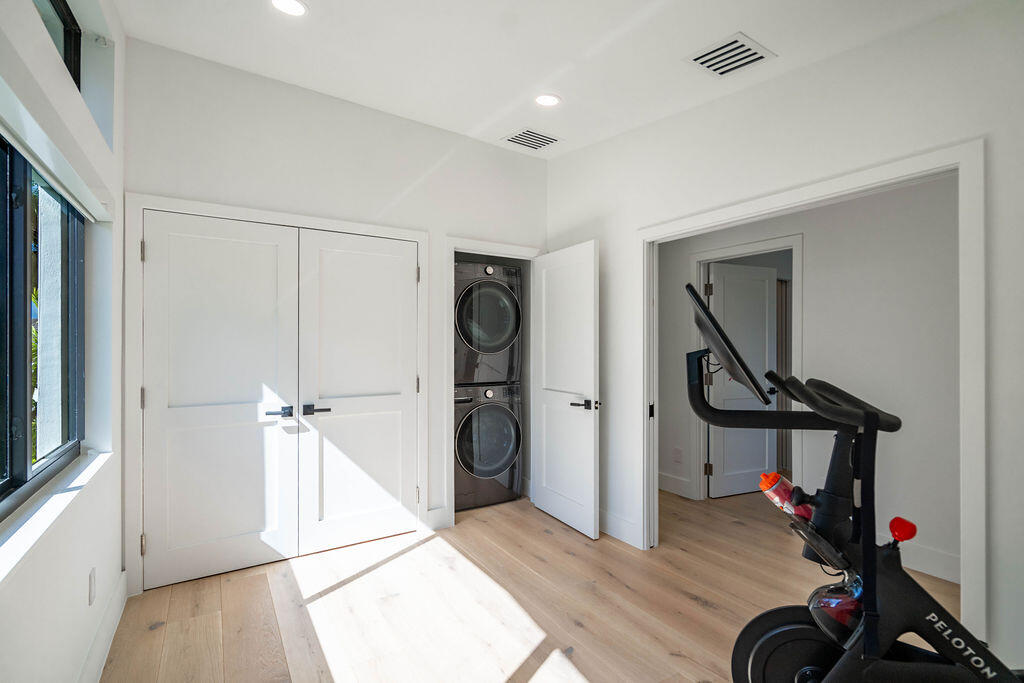 3001 Northeast 52nd Street Lighthouse Point, FL 33064 - Photo 41 of 61 a view of a room with gym equipment