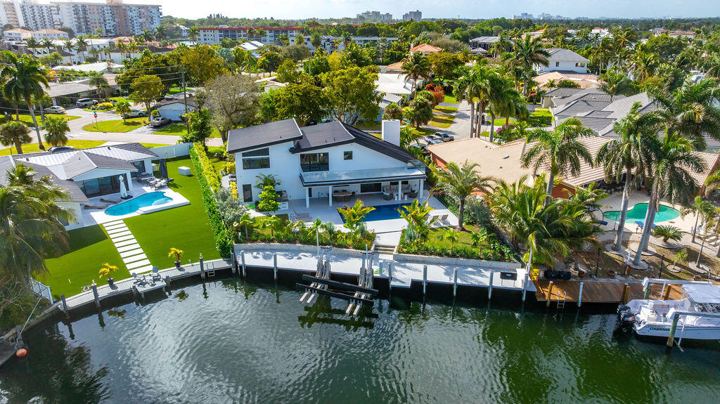 3001 Northeast 52nd Street Lighthouse Point, FL 33064 - Photo 60 of 61 an aerial view of house with yard swimming pool and outdoor seating