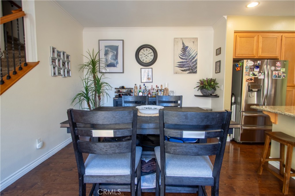 8090 Cornwall Court, Unit 38 Rancho Cucamonga, CA 91739 - Photo 17 of 47 a view of a dining room with furniture