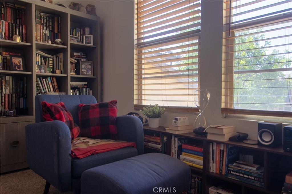 8090 Cornwall Court, Unit 38 Rancho Cucamonga, CA 91739 - Photo 31 of 47 a living room with furniture and a window
